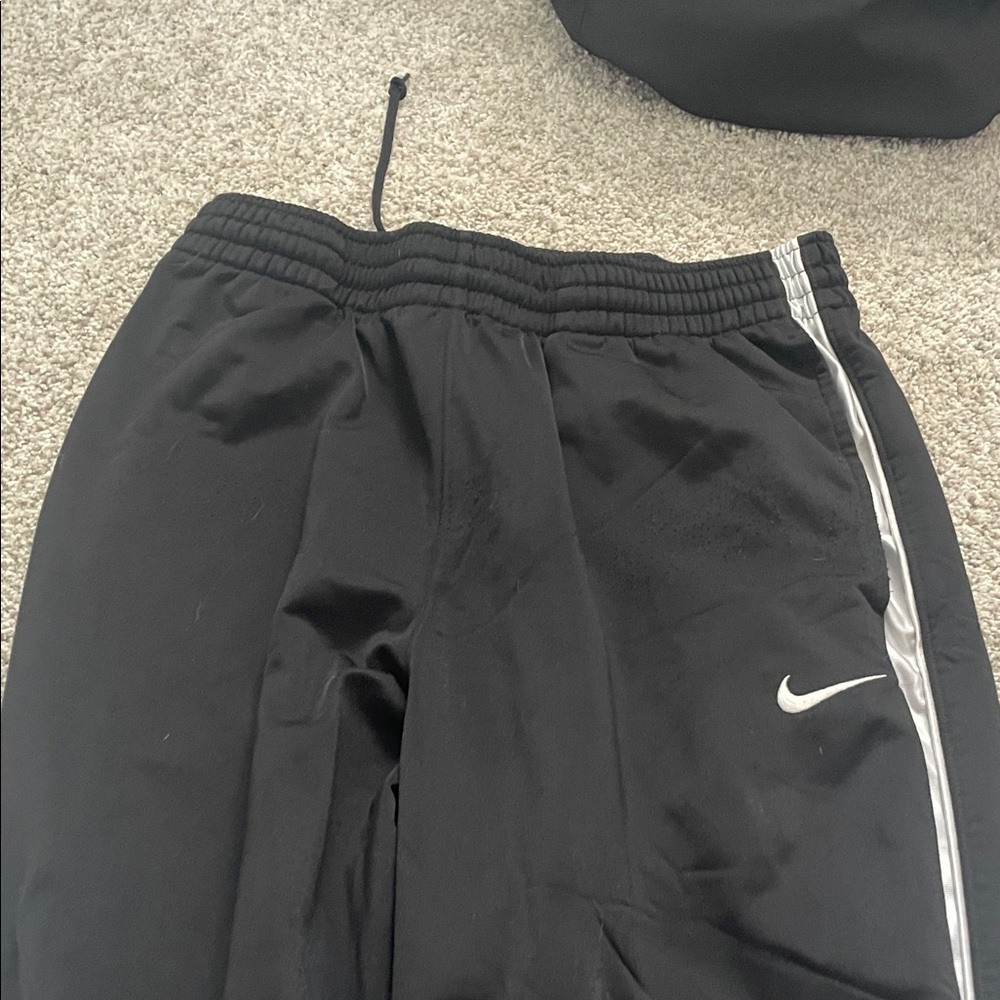 Nike Kids Black Joggers with Silver Stripe
